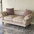 Plaid Pattern Three Seater Sofa With Rolled Arms Brown Pillows And Black Legs 3d model