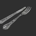 Elegant Silver Knife And Fork Cutlery Set With Decorative Engraved Handles