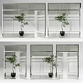 Modern Architectural Interior Featuring Glass Doors Windows And Green Plant In Black Pot