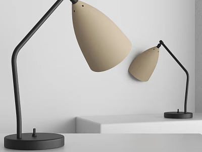 Modern Table Lamps With Beige Shades And Black Frames On White Tabletop 3d model