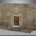 Ancient Stone Building Entrance With Arched Doorway Wooden Door And Stone Steps