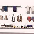 Soft Various Colored Bath Towels Hanging On Rods With Bathroom Toiletries And Accessories