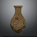 Golden Carved Vase With Intricate Floral Patterns And Decorative Details