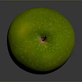 Fresh Green Apple With Yellow Spots On Shiny Surface And Dark Background