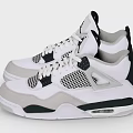 White and Black Jordan Sneakers with Gray Accents and Mesh Detailing