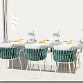 Modern Dining Table Set With Green Woven Chairs Tableware Wine Glasses And Pendant Light