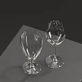 Two Elegant Transparent Wine Glasses Placed On Grey Table Against Dark Background