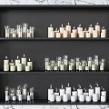 Decorative Candle Lamps Arranged On Black Shelf With Various Styles And Sizes