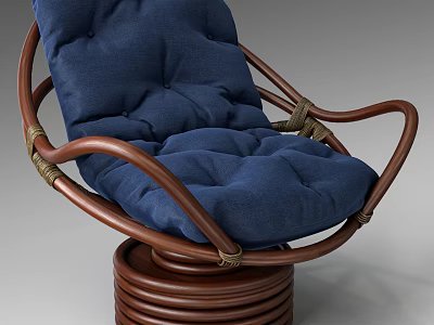 Comfortable Outdoor Chair With Blue Cushion And Brown Wicker Swivel Base 3d model