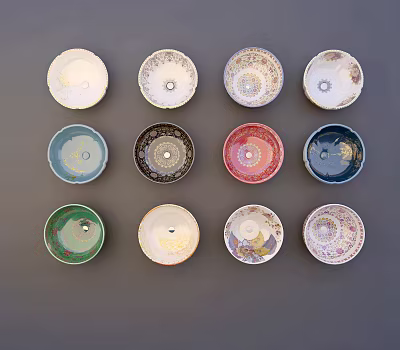 Twelve Washbasins With Various Colors And Different Patterns Arranged 3d model