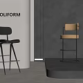 Modern Black and Beige Bar Stools in Showcase with Gray Wall White Column Golden Curtains
