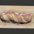 Fresh Submarine Sandwich on Wooden Cutting Board with Crusty Toasted Bread