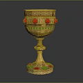 Ornate Golden Wine Goblet With Red Green Gemstones And Intricate Carved Design