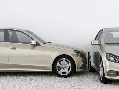 Two Beige And Silver Sedans Parked Front Facing Each Other On Pebble Ground 3d model