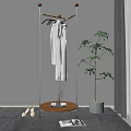 Contemporary Clothes Rack with White Garments Small Table Plant Books and Shoes Near Gray Wall