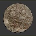 Ancient Circular Coin With Rusted Metallic Surface And Historical Engraved Design