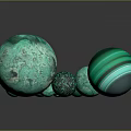 Green Decorative Spheres for Home Decor with Various Sizes and Textures on Gray Background
