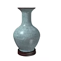 Elegant Celadon Ceramic Vase With Crackle Glaze Pattern On Dark Wooden Base Decor