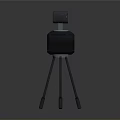 Modern Black Electronic Projector Appliance On Tripod Stand For Home Use