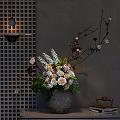 Elegant Floral Display in Terracotta Vase with Roses Hydrangeas Green Foliage on Table Against Gray Wall
