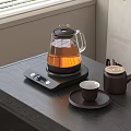 Modern Glass Electric Kettle With Digital Display Heating Base And Teapot On Tabletop