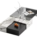 Modern Coffee Table with Marble Surface Black Drawer Vase Branches Magazine and Eggs