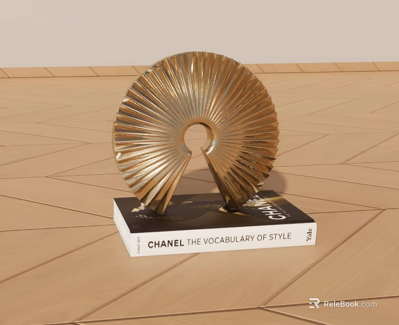 Chanel The Vocabulary of Style Book With Golden Decorative Sculpture On Wooden Floor 3d model 