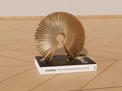 Chanel The Vocabulary of Style Book With Golden Decorative Sculpture On Wooden Floor 3d model