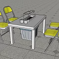 Practical Black Outdoor Dining Table Set With Yellow Folding Chairs And Metal Rack
