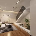 Modern Leisure Area With Sofa Round Coffee Table Floor Lamp Staircase Plants And Wooden Flooring