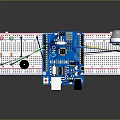 Electronic Circuit Components On Breadboard With LED Lights And Connecting Wires