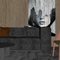 Modern Dark Grey Sofa And Round Coffee Table Set With Green Plant And Wall Art
