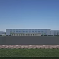 Modern Industrial Factory Building With White Exterior Large Glass Windows And Green Lawn Area