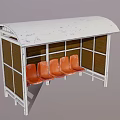 Bus Stop With Worn White Roof Brown Panels And Orange Seats
