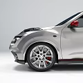Silver Compact Sports Car Featuring Sporty Design Red Accents And Alloy Wheels