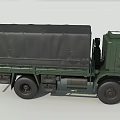 Green Military Transport Truck With Canvas Covered Cargo Area And Cab