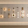 Modern Wall Sconces With Various Designs And Illuminated Glass Shades On Wall