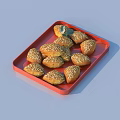 Golden Sesame Covered Pastries Arranged On Red Tray For Snacks
