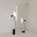 Modern Floor Lamps With White Circular Shades And Black Bases In Minimalist Interior