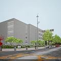 Modern White Office Building With Large Glass Windows Surrounded by Green Trees Road and Cars
