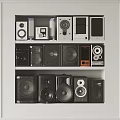 Headphones And Audio Speakers On Display Shelves With Various Designs And Models