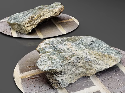 Natural Looking Rockery Stones Placed On Circular Trays With Grid Pattern 3d model