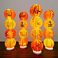 Decorative Traditional Chinese Orange Yellow Lanterns Stacked With Calligraphy On Wooden Base
