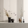 Black White Brown Vases With Dried Grass Purple Spikes On Light Countertop Striped Wall