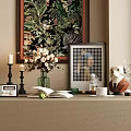Decorative Ornament Combination With Framed Artwork Vase Flowers Candles Open Book Vintage Radio And Figurines