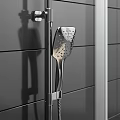 Modern Chrome Shower Head With Handheld Sprayer In Black Tile Bathroom