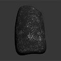 Black Stone Sculpture With Intricate Glowing Green Pattern And Decorative Design