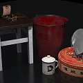 Wooden Table With Red Metal Bucket White Patterned Mug And Decorative Red Box