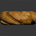 Golden Orange Ring Shaped Bread With Black Sesame Seeds And Twisted Texture