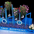 Blue Frame Photo Check In Spot With HEALTH Sign And Colorful Floral Decorations